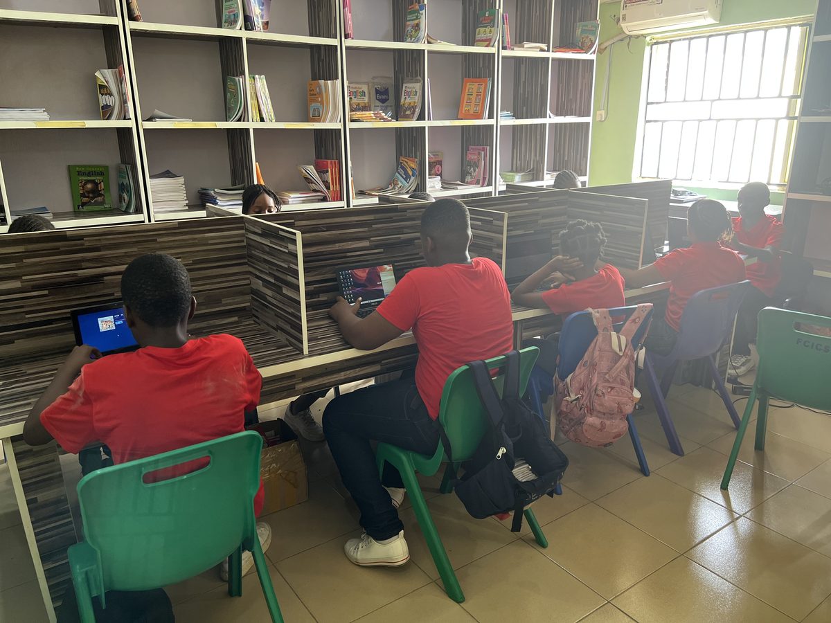 Students in the library computer corner